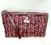 zadig et voltaire pochette zippée en toile et cuir bordeaux et rose