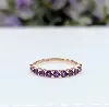 bague demie alliance ornée de 11 pierres violettes or 375 millième (9 ct) 1,73g