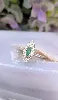 bague marquise centrée d'une émmeraude entourée de 12 diamants or 750 millième (18 ct) 2,67g