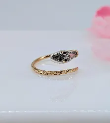 bague serpent en or jaune et argent sertie de rubis et diamants en rose or 750 millième (18 ct) 4,65g