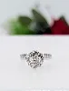 bague solitaire centrée d'un diamant d'environ 0,45cts entouré de 20 petits diamants or 750 millième (18 ct) 3,65g