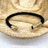brac bracelet en cuir noir tressé et fermoir en acier doré l21 cm