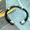 brac bracelet en cuir noir tressé et oeil de tigre avec acier argenté 8mm l21cm