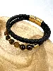 brac bracelet en cuir noir tressé, oeil de tigre d8mm, fermoir en acier doré l21 cm