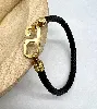 brac bracelet fine en cuir noir tressé et fermoir en acier doré l21 cm