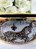 bracelet hermès émail cloisonné noir et or motifs équestres