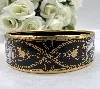 bracelet hermès émail cloisonné noir et or motifs équestres