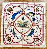 carré 90 / foulard hermès "springs" en soie dans les tons dominants blanc et rouge 88 x 88 cm
