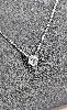 collier en or blanc ornée d'un pendentif diamant solitaire d'environ 0,60ct taille brillant or 750 millième (18 ct) 1,99g