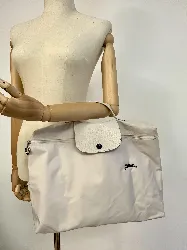 sac à main / porte document longchamp le pliage en toile blanche