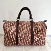 sac de voyage bowling christian dior vintage en tissu jacquard dior oblique et cuir couleur bordeau