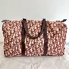 sac de voyage bowling christian dior vintage en tissu jacquard dior oblique et cuir couleur bordeau