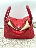 sac hermès lindy 30 en cuir rouge avec finition métallique argenté