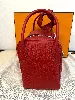 sac hermès lindy 30 en cuir rouge avec finition métallique argenté