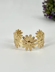 31222864 bracelet manchette motif marguerite en acier doré