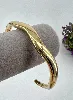 31225562 bracelet jonc motif vague en acier doré