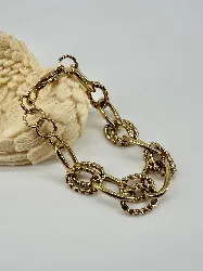 31226421 bracelet maillons entrelacés en acier doré