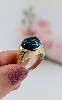 bague bombée sertie d'une tourmallne bleue en cabochon or 750 millième (18 ct) 6,31g