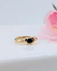 bague or centrée d'un saphir bleu foncé or 750 millième (18 ct) 3,21g