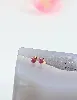 boucles d'oreilles chacune ornée d'un rubis or 750 millième (18 ct) 0,38g