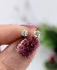 boucles d'oreilles puces chacune sertie d'un diamant d'environ 0,20ct or 750 millième (18 ct) 0,59g