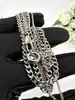 collier a.p.c. double chaîne en laiton teinté argent l50cm