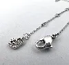 collier swarovski avec pendentif en forme d'aile pavé de cristaux incolores