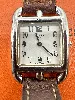 montre hermès cap cod bracelet double tour en cuir marron, mouvement quartz, boîtier et finition métallique en acier argenté
