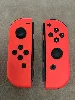 paire de joycon nintendo switch rouge
