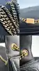 sac à chaîne yves saint laurent kate en cuir noir embossé crocodile, édition spéciale noël 2023