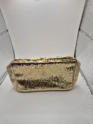 trousse de toilette yves saint laurent dorée