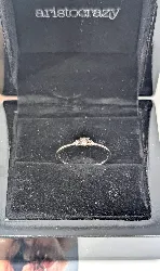 bague créateur aristocrazy trio en or blanc avec un diamant central d'environ 0,10cts entouré de petits diamants or 750 millième (