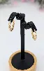 boucles d'oreilles créoles motifs tournants  or 750 millième (18 ct) 2,70g