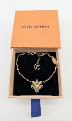 bracelet louis vuitton glory v m00373 en métal doré serti d'oxydes incolores