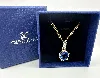 collier swarovski doré avec pendentif en cristal bleu
