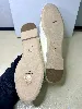 espadrilles / mocassins chanel logo noir sur le cuir d'agneau beige