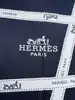 foulard hermès bolduc en jersey de soie blanc et noir avec une certaine élasticité version 2009