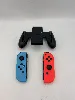 paire de joycon nintendo bleu et jaune fluo