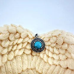 pendentif en argent orné d'une turquoise  argent autre 2,3g