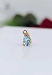 pendentif or serti d'une topaze bleue forme goutte d'eau or 750 millième (18 ct) 0,70g