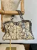sac coach maddison pinnacle en cuir gris embossé python