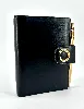 agenda cartier en cuir noir avec porte mine trinity