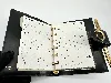 agenda cartier en cuir noir avec porte mine trinity
