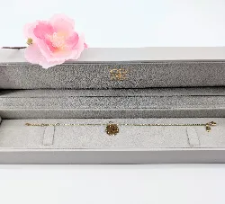 bracelet guérin en or orné d'un pendentif rond en breloque or 750 millième (18 ct) 1,98g