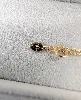 bracelet guérin en or orné d'un pendentif rond en breloque or 750 millième (18 ct) 1,98g