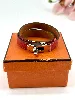 bracelet hermès kelly double tour couleur rouge vermillon finition argenté