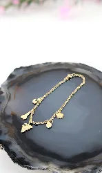 bracelet maille forçat orné de 5 charms pendants or 750 millième (18 ct) 3,25g