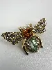 broche abeille métal doré ornée des strass et perles