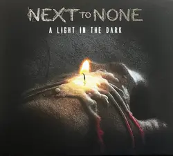 cd next to none - a light in the dark (2015)