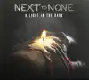 cd next to none - a light in the dark (2015)